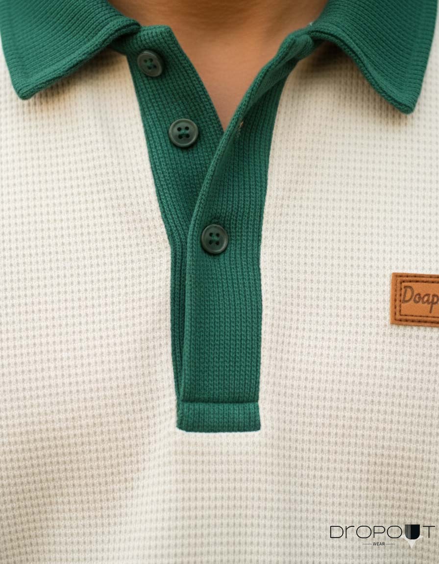 "Men’s oversized off-white waffle polo in soft knit material with short sleeves"