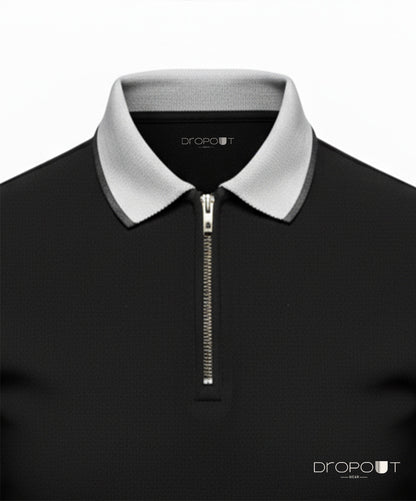 Black zipper polo shirt with white grey collar on a white background, featuring the Dropout brand.