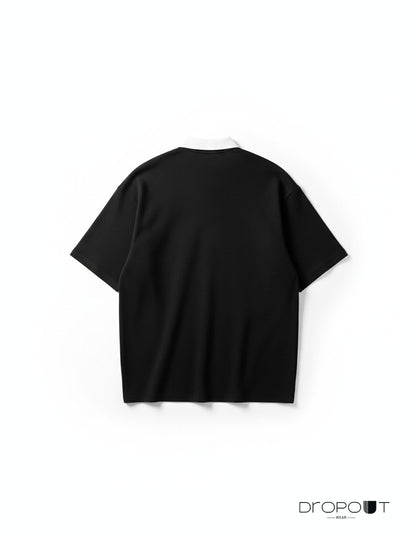 "Unisex black oversized polo shirt in waffle knit with drop shoulders and classic collar"