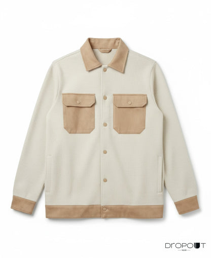 “Camel knitted suede shacket with suede collar, cuffs, hem, and front pockets, finished with two handmade brass buttons covered in suede.”